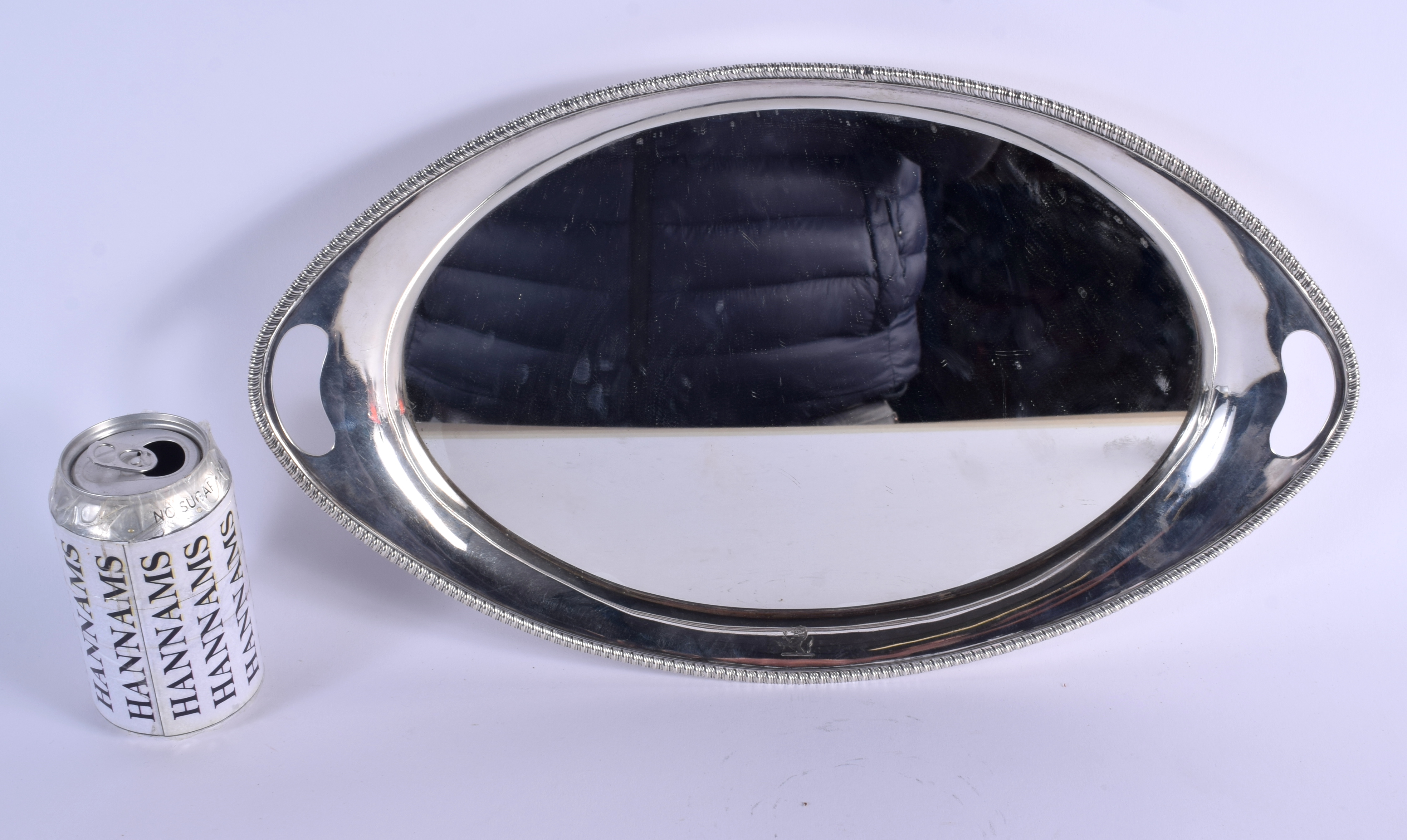 A VICTORIAN TWIN HANDLED MIRRORED SERVING TRAY. London 1896. 1242 grams overall. 42 cm wide.