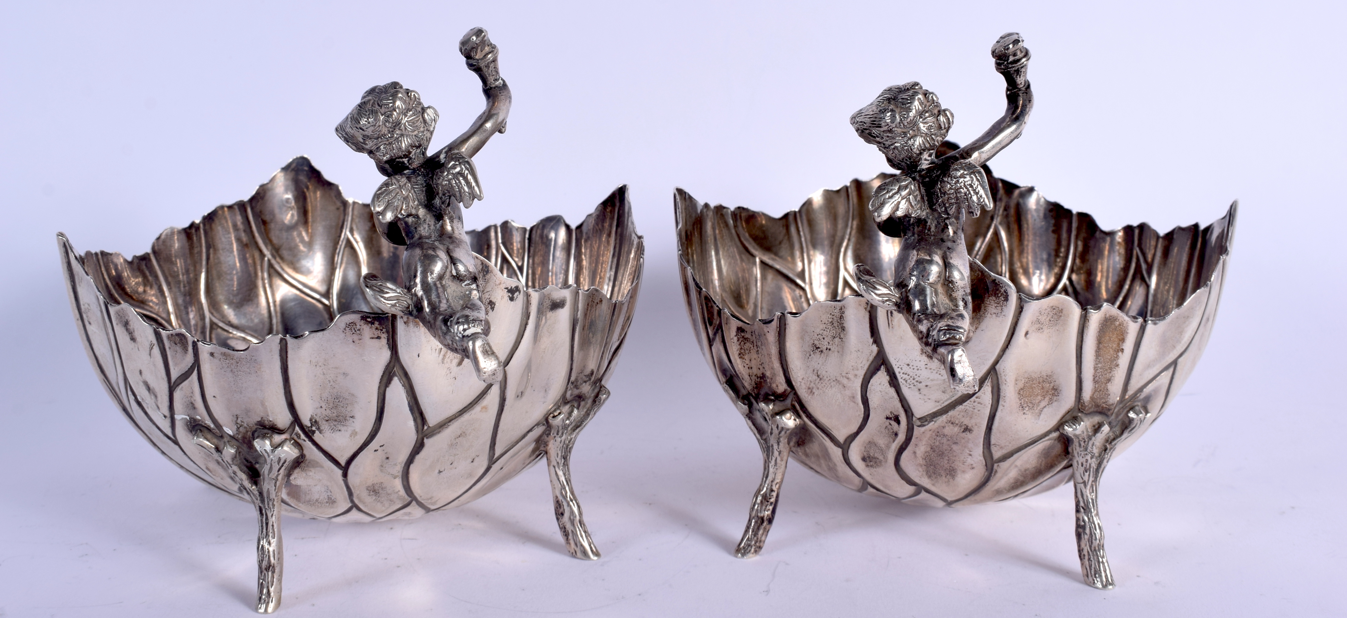 A PAIR OF EARLY 20TH CENTURY SILVER CHERUB BOWLS formed as open flowers. 640 grams. 13 cm x 15 cm. - Image 2 of 4