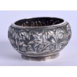 A 19TH CENTURY CHINESE EXPORT SILVER SALT by Luen Hing, decorated with flowering plants. 27 grams. 4