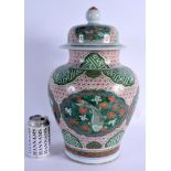 A LARGE 19TH CENTURY CHINESE WUCAI PORCELAIN VASE AND COVER Qing, enamelled with fish amongst foliag