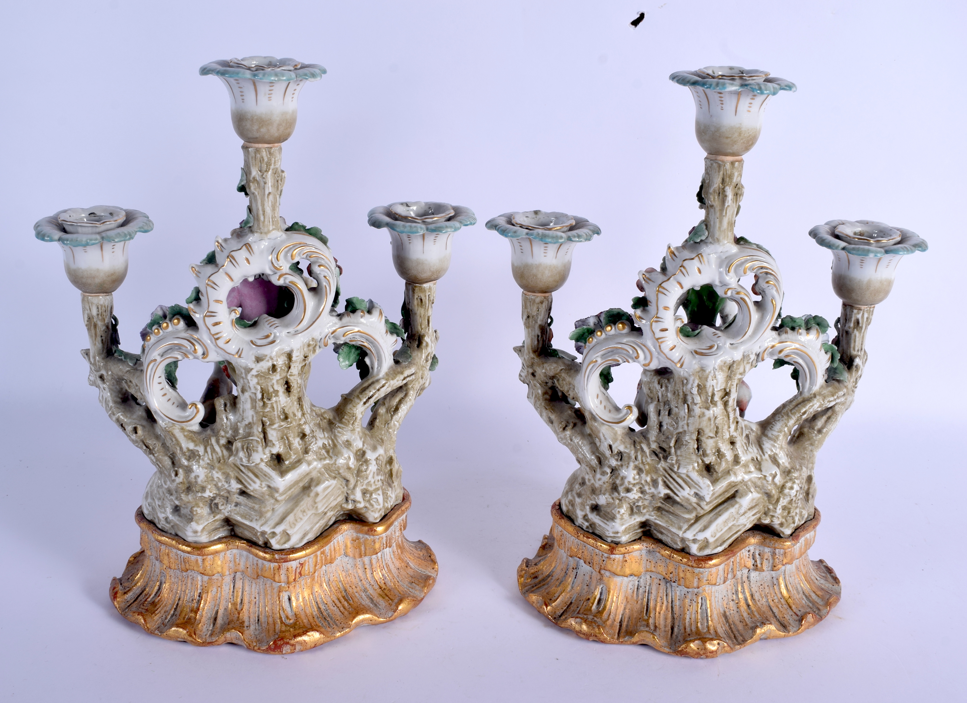 A PAIR OF 19TH CENTURY CONTINENTAL PORCELAIN FIGURES modelled upon a rococo base. Porcelain 26 cm x - Image 2 of 4