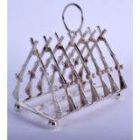 A SILVER PLATED RIFLE TOAST RACK. 11 cm x 5 cm.