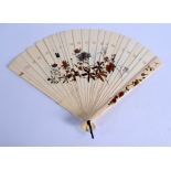 A 19TH CENTURY JAPANESE MEIJI PERIOD SHIBAYAMA GOLD LACQUER IVORY FAN decorated with birds and insec