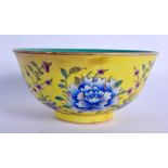 A CHINESE YELLOW GLAZED PORCELAIN BOWL 20th Century. 15 cm diameter.