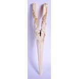 A 19TH CENTURY EUROPEAN CARVED IVORY GLOVE STRETCHERS. 27 cm long.