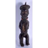 AN AFRICAN TRIBAL CARVED WOOD FIGURE OF A BEADED MALE with vacant stomach. 42 cm high.
