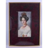 AN ANTIQUE PAINTED IVORY PORTRAIT MINIATURE modelled wearing a coral necklace. Image 10.5 cm x 5 cm.