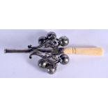 A VICTORIAN SILVER AND BONE BABIES RATTLE. 13 cm long.