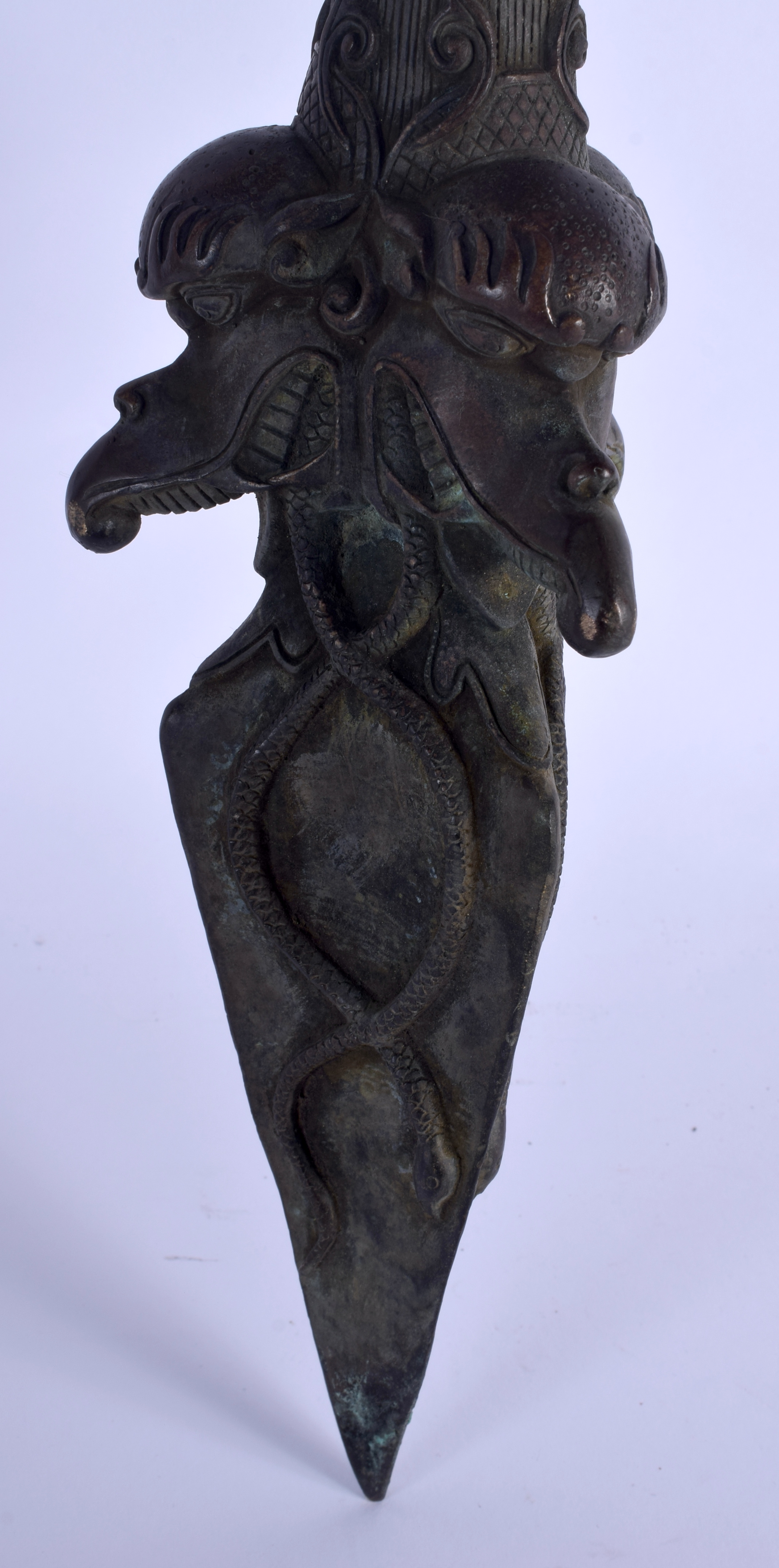 A LARGE CHINESE TIBETAN BRONZE PHURBA modelled with buddhistic mask heads. 60 cm long. - Image 5 of 5