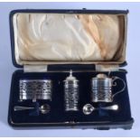 AN ART DECO SILVER CRUET SET. Birmingham 1918. Silver 106 grams. (5)