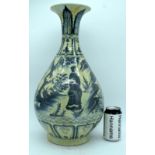 A large Chinese blue and white vase decorated with figures in a landscape 64cm.
