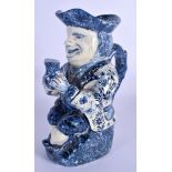 AN ANTIQUE DUTCH BLUE AND WHITE DELFT POTTERY TOBY JUG modelled as a male holding an ale jug. 27 cm