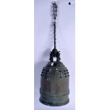 AN 18TH CENTURY JAPANESE EDO PERIOD BRONZE BELL with dimpled decoration. 33 cm x 16 cm.