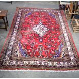 A large Persian thick pile rug 386 x 260cm.