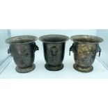 Three silver plate Urns/ice buckets with lion head handles 26 x 23 cm (3).