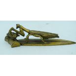 A small bronze of a locust consuming a beetle 19cm .