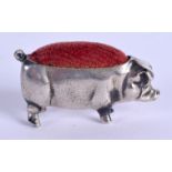AN ANTIQUE SILVER PLATED PIG PIN CUSHION. 33 grams. 4 cm wide.