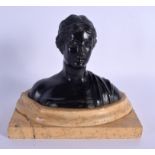 A 19TH CENTURY EUROPEAN BRONZE BUST OF A CLASSICAL FEMALE modelled upon a fitted marble base. Bronze
