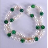 A 14CT GOLD PEARL AND JADE NECKLACE. 37 cm long.