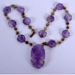 AN EARLY 20TH CENTURY CHINESE GOLD MOUNTED AMETHYST NECKLACE Late Qing. 40 cm long.