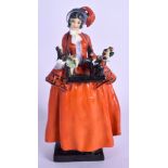 A ROYAL DOULTON FIGURE OF MISS SKETCH C1923. 19 cm high.