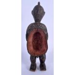 AN UNUSUAL AFRICAN CARVED TRIBAL FERTILITY FIGURE modelled with a vacant stomach. 20 cm high.