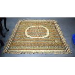 A LARGE VINTAGE MIDDLE EASTERN EMBROIDERED SILK WALL HANGING. 179 cm x 240 cm.