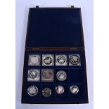ELEVEN BOXED SILVER PROOF COINS. (11)