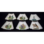 A set of Swedish Wingaker ceramic dishes depicting Swedish folk in various pursuits 17 x 13cm (6)