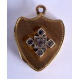 AN ANTIQUE YELLOW METAL PENDANT. 10 grams. 3 cm x 2 cm.