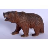 A BAVARIAN BLACK FOREST CARVED WOOD FIGURE OF A BEAR. 14 cm x 11 cm.