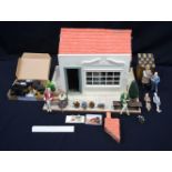 A fitted Dolls house together with a quantity of related parts 35 x 26 x 33 Qty.