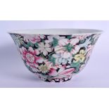 AN EARLY 20TH CENTURY CHINESE FAMILLE ROSE MILLIFIORE BOWL Guangxu, painted with flowers. 17 cm diam