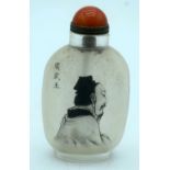 A Chinese snuff bottle decorated with calligraphy and a Chinese male. 9cm.