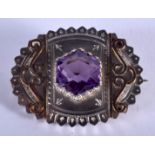 A VINTAGE SILVER AND AMETHYST BROOCH. 7 gras. 3.5 cm x 3 cm.