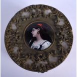 A 19TH CENTURY FRENCH BRONZE AND LIMOGES AND ENAMEL BOX painted with a gypsy girl. 20 cm x 11 cm.