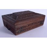 A 19TH CENTURY ANGLO INDIAN CARVED SANDALWOOD WRITING BOX AND COVER with fitted slope. 32 cm x 22 cm