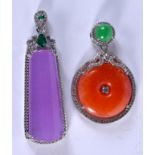 TWO SILVER PENDANTS. (2)