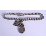 AN ANTIQUE SILVER WATCH CHAIN. 103 grams. Birmingham 1881 & 1915. Largest pendant 4 cm x 2.5 cm.