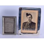 TWO SILVER PHOTOGRAPH FRAMES. 400 grams overall. Largest 22 cm x 17 cm. (2)