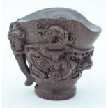A Chinese carved Libation cup 8cm.