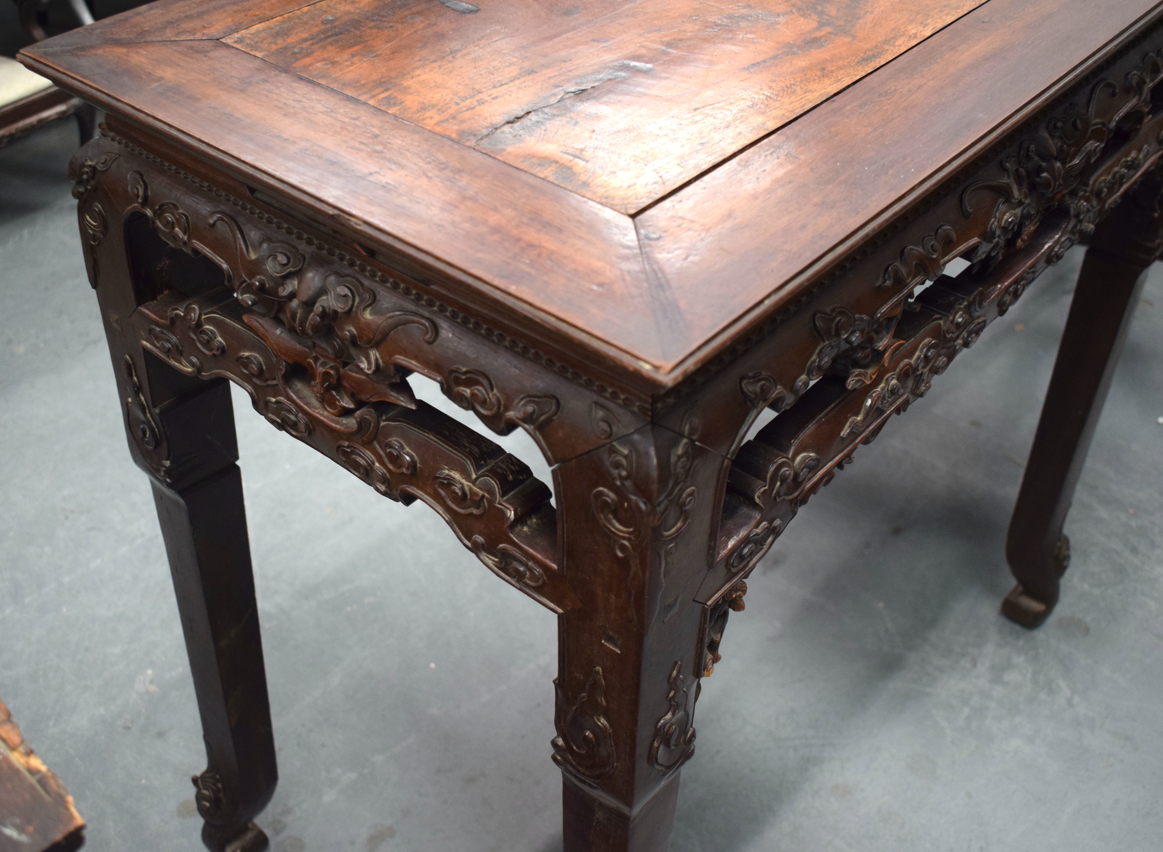 A FINE 19TH CENTURY CHINESE CARVED HONGMU HARDWOOD TABLE Qing, carved with mask heads and extensive - Image 7 of 8