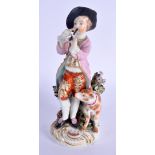 18th c. Derby figure of a boy standing beside a dog playing a pipe, patch marks. 18cm high