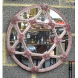 A 1930S VENETIAN PINK GLASS MIRROR. 50 cm wide.