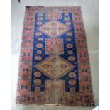A Caucasian Shirvan rug 207 x 122cm.