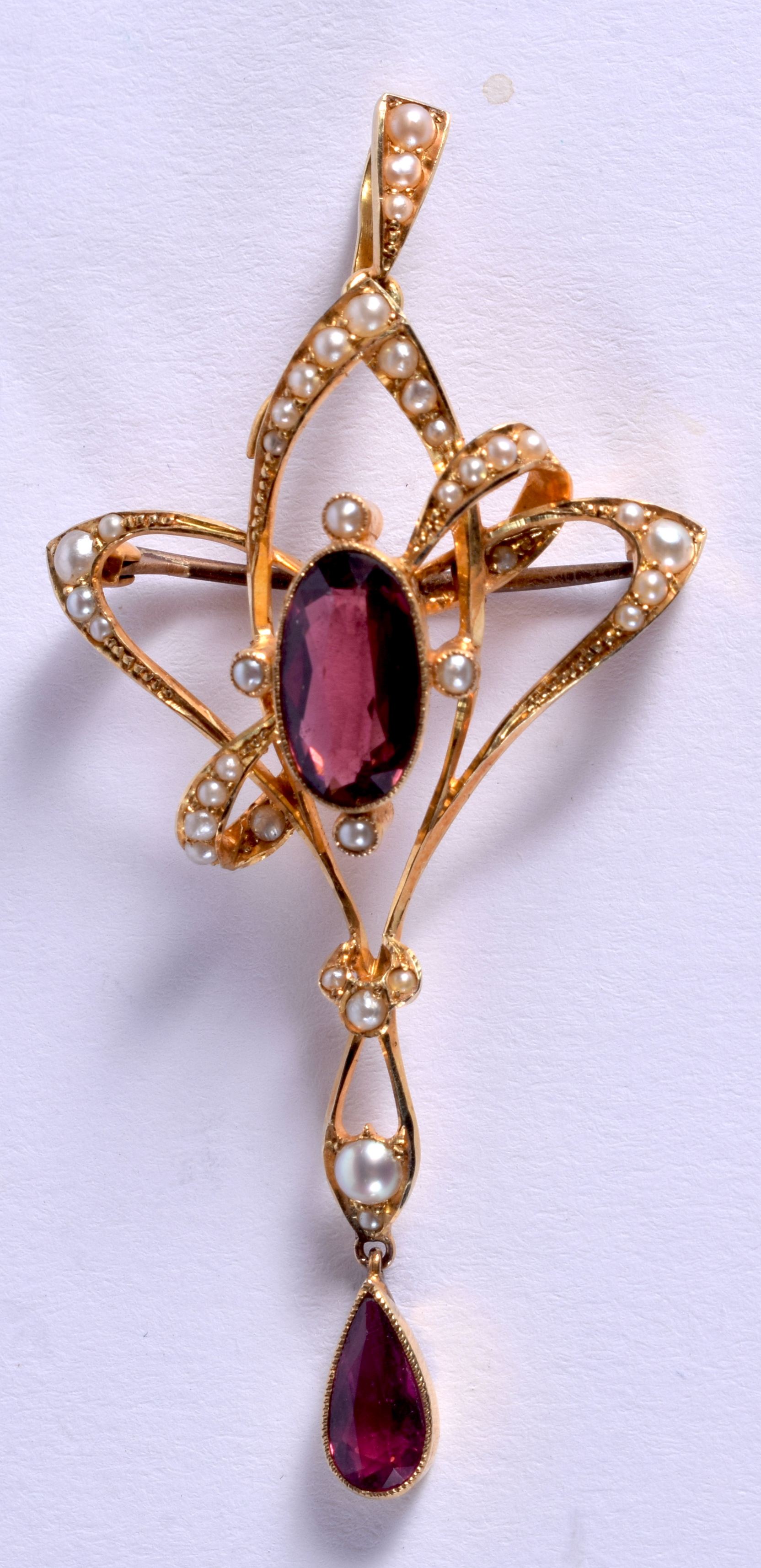 AN ART NOUVEAU 15CT GOLD PEARL GARNET BROOCH. 5 grams. 4 cm x 3 cm.