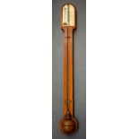 AN ANTIQUE MAHOGANY CASED BAROMETER. 87 cm long.