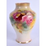 Royal Worcester amphora shaped vase painted with pink and red roses by Mille Hunt, signed, date code