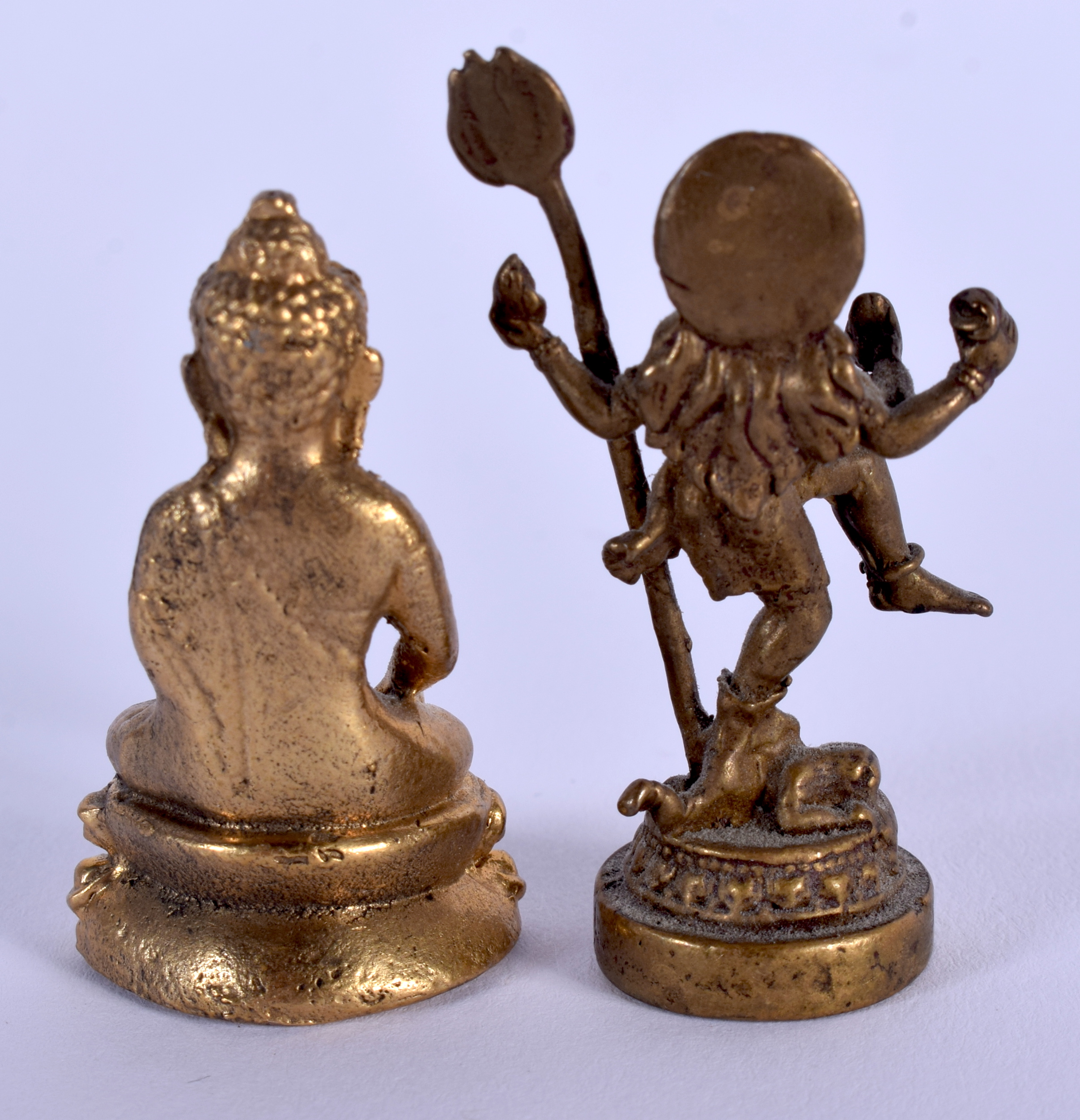 AN EARLY 20TH CENTURY SINO TIBETAN BRONZE BUDDHA together with another similar. Largest 3.5 cm high. - Image 2 of 3