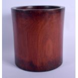 A CHINESE QING DYNASTY CARVED HARDWOOD BRUSH POT Bitong, of plain form. 17 cm x 11 cm.